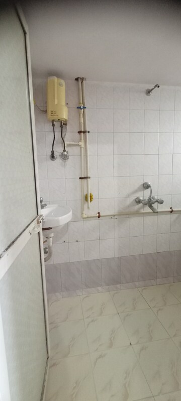 Bathroom in 2 BHK Apartment at Charkop Priya CHS, Kandivali West – for Rent