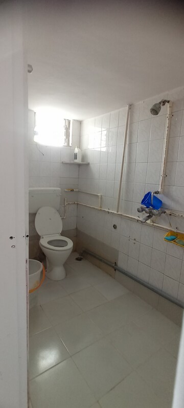Bathroom in 2 BHK Apartment at Charkop Priya CHS, Kandivali West – for Rent