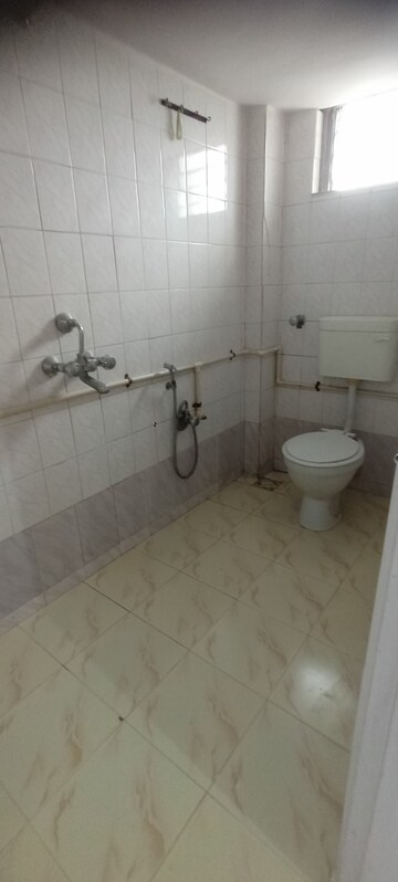 Bathroom in 2 BHK Apartment at Charkop Priya CHS, Kandivali West – for Rent