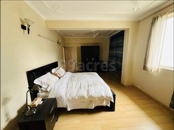 Bedroom in 3 BHK Builder Floor at DLF The Belvedere Park, Sector 24 – for Rent