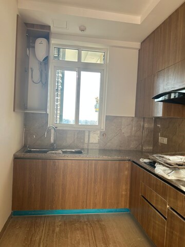 Kitchen in 3 BHK Apartment at Ambience Creacions, Sector 22 – for Rent