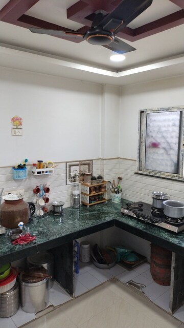 Kitchen in 2 BHK Apartment at Shantinagar Colony – for Sale