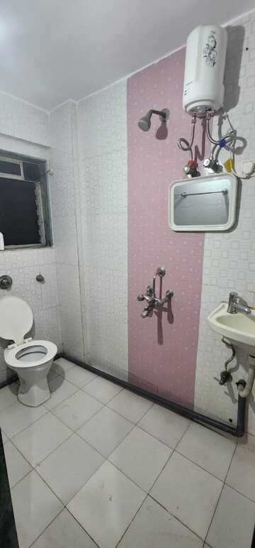 Bathroom in 2 BHK Apartment at Kopar Khairane – for Rent