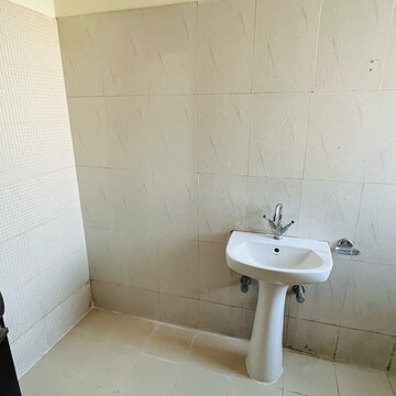 Bathroom in 2 BHK Apartment at Maya Garden City, Nagla Road – for Rent