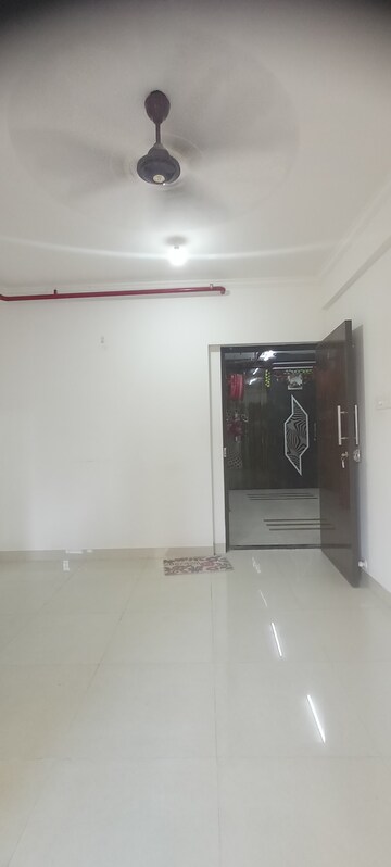 Living Room in 1 BHK Apartment at Sethia Kalpavruksh Heights, Kandivali West – for Rent