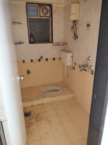 Bathroom in 3 BHK Apartment at Bhoomi Park II, Malad West – for Rent
