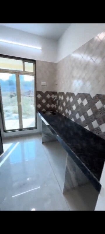 Kitchen in 2 BHK Apartment at Dynamic Crest, Shilphata – for Sale