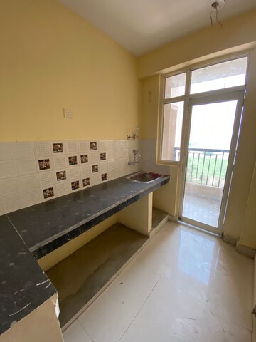 Kitchen in 2.5 BHK Apartment at Eureka Diya Green City, Raj Nagar Extension – for Sale
