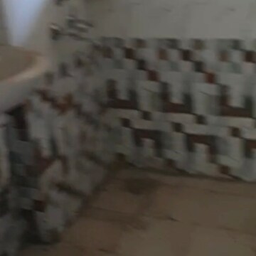 Bathroom in 2 BHK Apartment at Sikka Kaamna Greens, Sector 143 – for Rent
