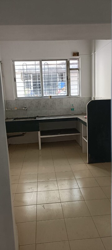 Kitchen in 1 BHK Apartment at Wadgaon Sheri – for Rent