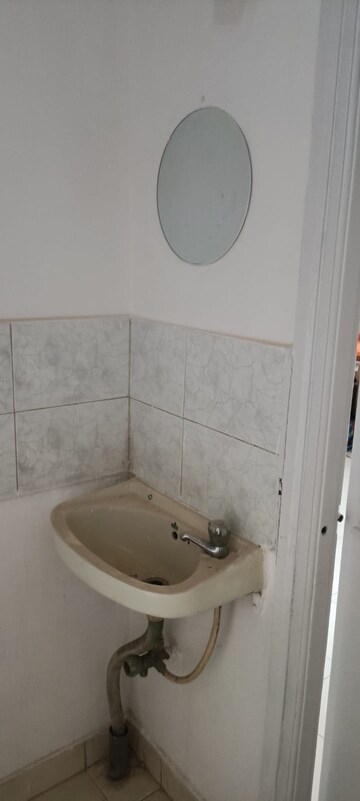 Bathroom in 1 BHK Apartment at Wadgaon Sheri – for Rent
