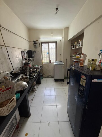 Kitchen in 2 BHK Apartment at Shubharambh Complex, Manpada – for Sale