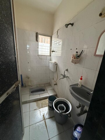 Bathroom in 2 BHK Apartment at Shubharambh Complex, Manpada – for Sale