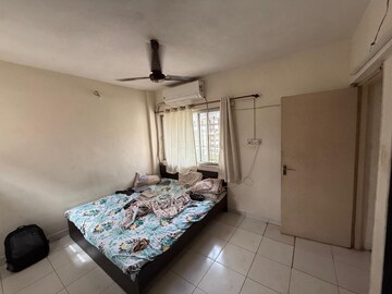 Bedroom in 2 BHK Apartment at Shubharambh Complex, Manpada – for Sale