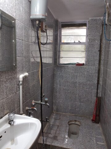 Bathroom in 3 BHK Apartment at Anant Apartment, Erandwane – for Rent