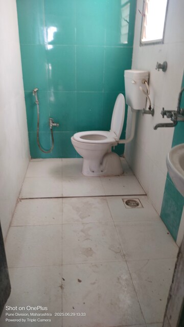 Bathroom in 2.5 BHK Apartment at Solitaire Co Op Housing Society Ltd, Dhanori – for Rent