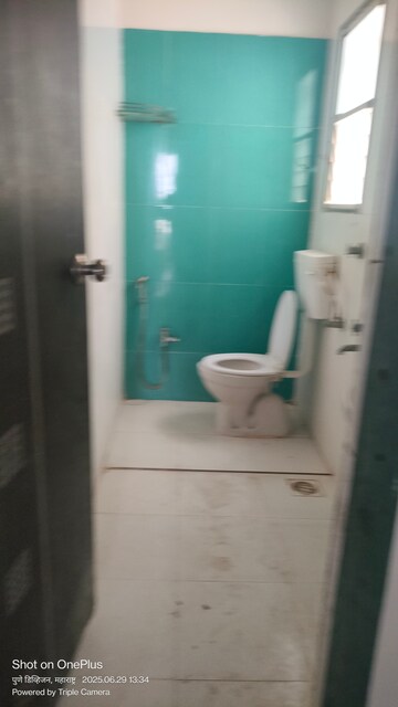 Bathroom in 2.5 BHK Apartment at Solitaire Co Op Housing Society Ltd, Dhanori – for Rent