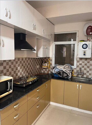 Kitchen in 2 BHK Apartment at Panchsheel Greens II, Sector 16 Greater Noida – for Rent