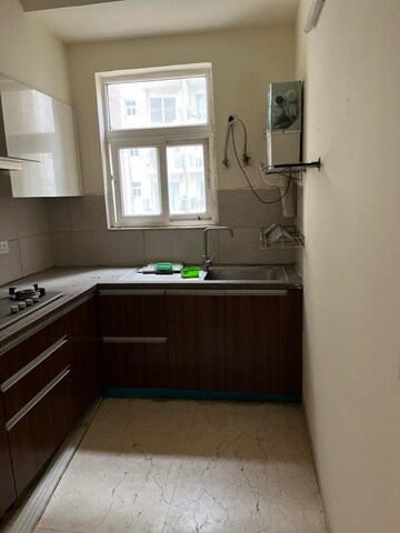 Kitchen in 3 BHK Apartment at Puri Anand Villas Phase II, Sector 81 – for Rent