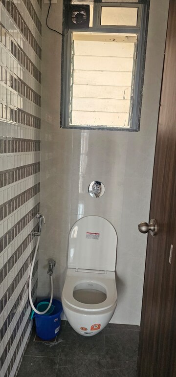 Bathroom in 1 BHK Apartment at Bhairaav Goldcrest Residency, Ghansoli – for Rent