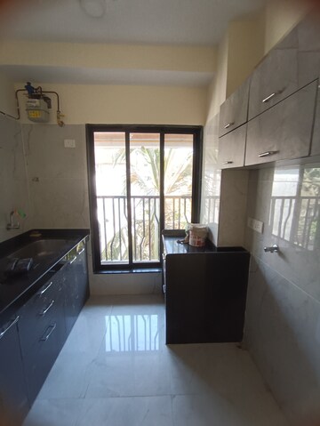 Kitchen in 2 BHK Apartment at Lotus Sky Garden, Malad West – for Rent