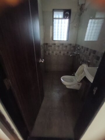 Bathroom in 2 BHK Apartment at Lotus Sky Garden, Malad West – for Rent