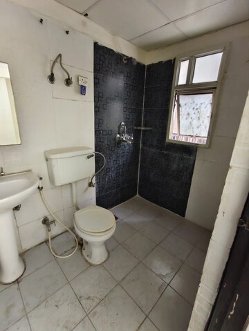 Bathroom in 2 BHK Apartment at Panchsheel Wellington, Dundahera – for Rent