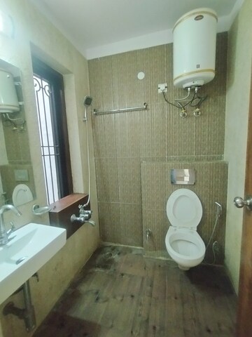 Bathroom in 3 BHK Builder Floor at Ansal Sushant Lok I, Sector 43 – for Rent