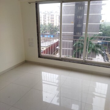 Bedroom in 2 BHK Apartment at Dharti Presidio, Malad West – for Rent