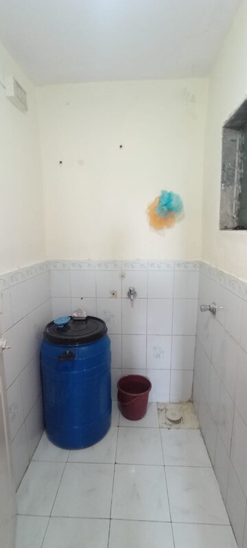 Bathroom in 1 BHK Apartment at New Mhada Tower, Malad West – for Rent