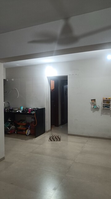 Living Room in 2 BHK Apartment at Ravinanda Trinity, Wagholi – for Rent