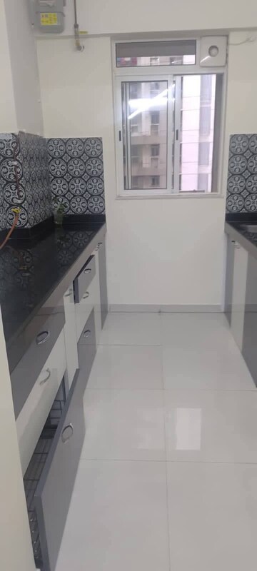 Kitchen in 1 BHK Apartment at Lodha Amara, Kolshet Road – for Rent