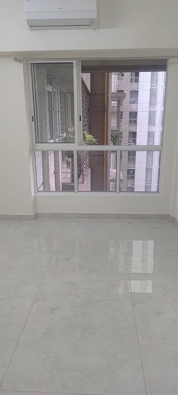 Living Room in 1 BHK Apartment at Lodha Amara, Kolshet Road – for Rent