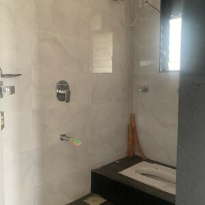 Bathroom in 3 BHK Apartment at Kosmos Nandanvan, Roshan Nagar – for Sale