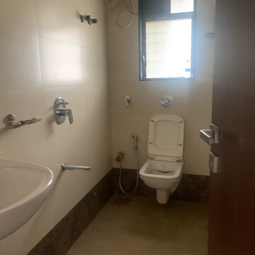Bathroom in 3 BHK Apartment at Kosmos Nandanvan, Roshan Nagar – for Sale