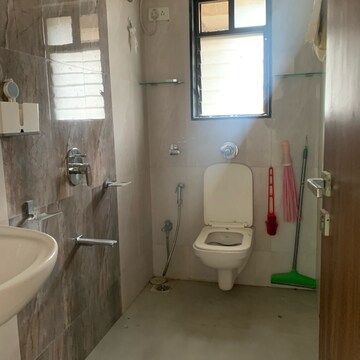 Bathroom in 3 BHK Apartment at Kosmos Nandanvan, Roshan Nagar – for Sale