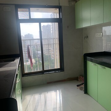 Kitchen in 3 BHK Apartment at Kosmos Nandanvan, Roshan Nagar – for Sale