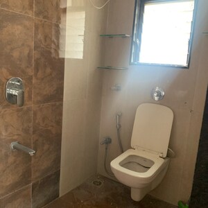 Bathroom in 3 BHK Apartment at Kosmos Nandanvan, Roshan Nagar – for Sale