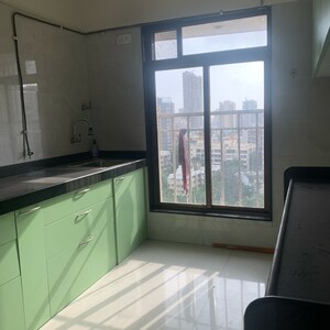 Kitchen in 3 BHK Apartment at Kosmos Nandanvan, Roshan Nagar – for Sale