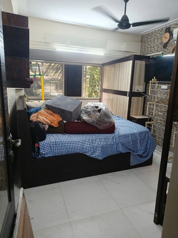 Bedroom in 2 BHK Apartment at Kabir CHS, Mahim – for Rent