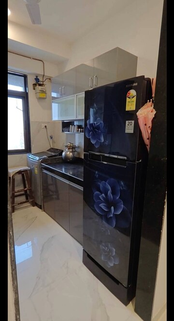 Kitchen in 2 BHK Apartment at Dev Leo Tower, Oshiwara – for Rent
