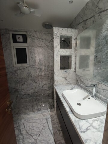 Bathroom in 3.5 BHK Apartment at Defence Colony – for Rent