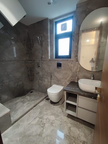 Bathroom in 3.5 BHK Apartment at Defence Colony – for Rent