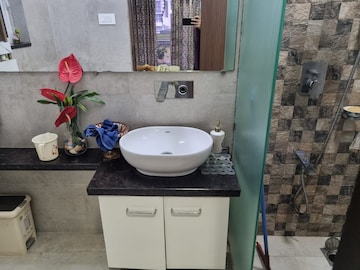 Bathroom in 2 BHK Apartment at Omkar Meridia, Kurla West – for Rent