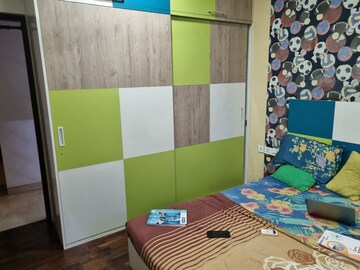 Bedroom in 2 BHK Apartment at Omkar Meridia, Kurla West – for Rent