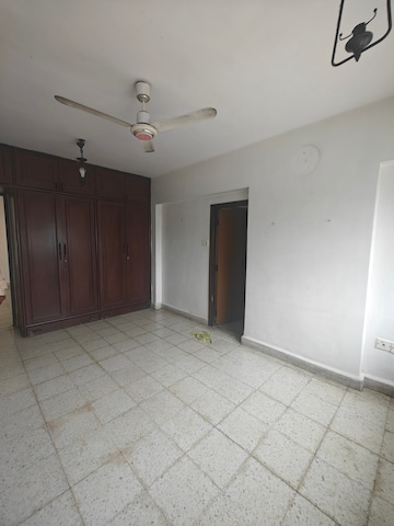Room in 2 BHK Apartment at Harbour Court, Nerul Sector 19a – for Rent