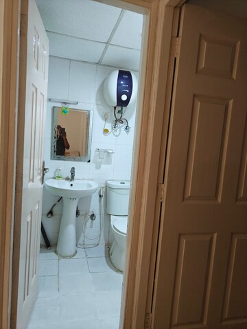 Bathroom in 2 BHK Apartment at Prateek Wisteria, Sector 77 – for Rent