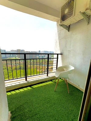 Balcony in 1 RK Apartment at Nimbus The Golden Palm, Sector 168 – for Sale