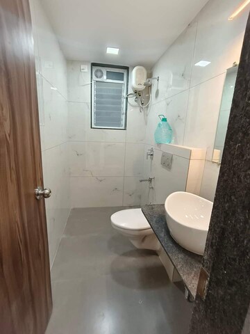 Bathroom in 2 BHK Apartment at Mohan Altezza, Kalyan West – for Rent