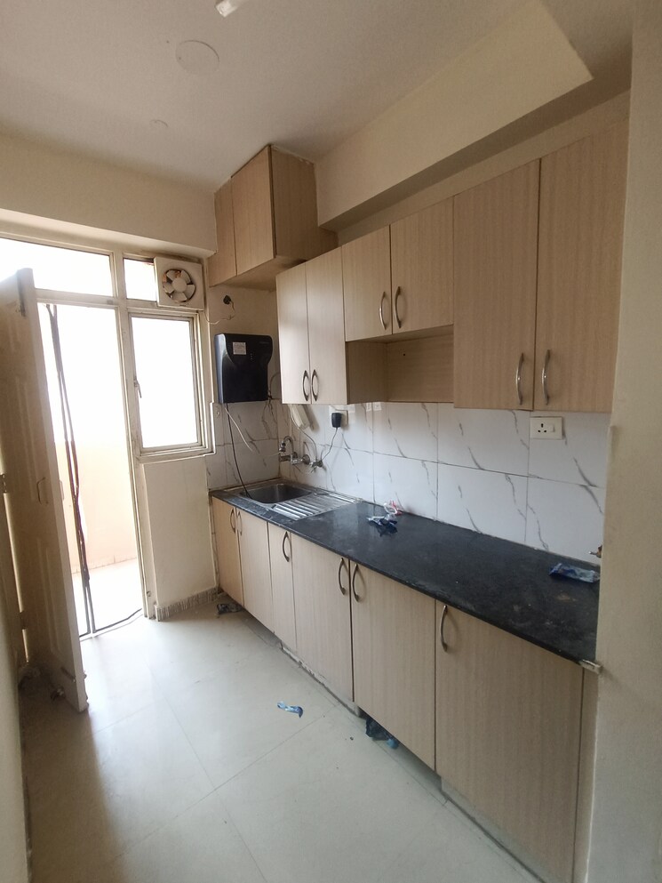 Kitchen, supertech-cape-town 2.5 Bedroom 1150 Sq.Ft. Apartment In Sector 74 Noida 8897334